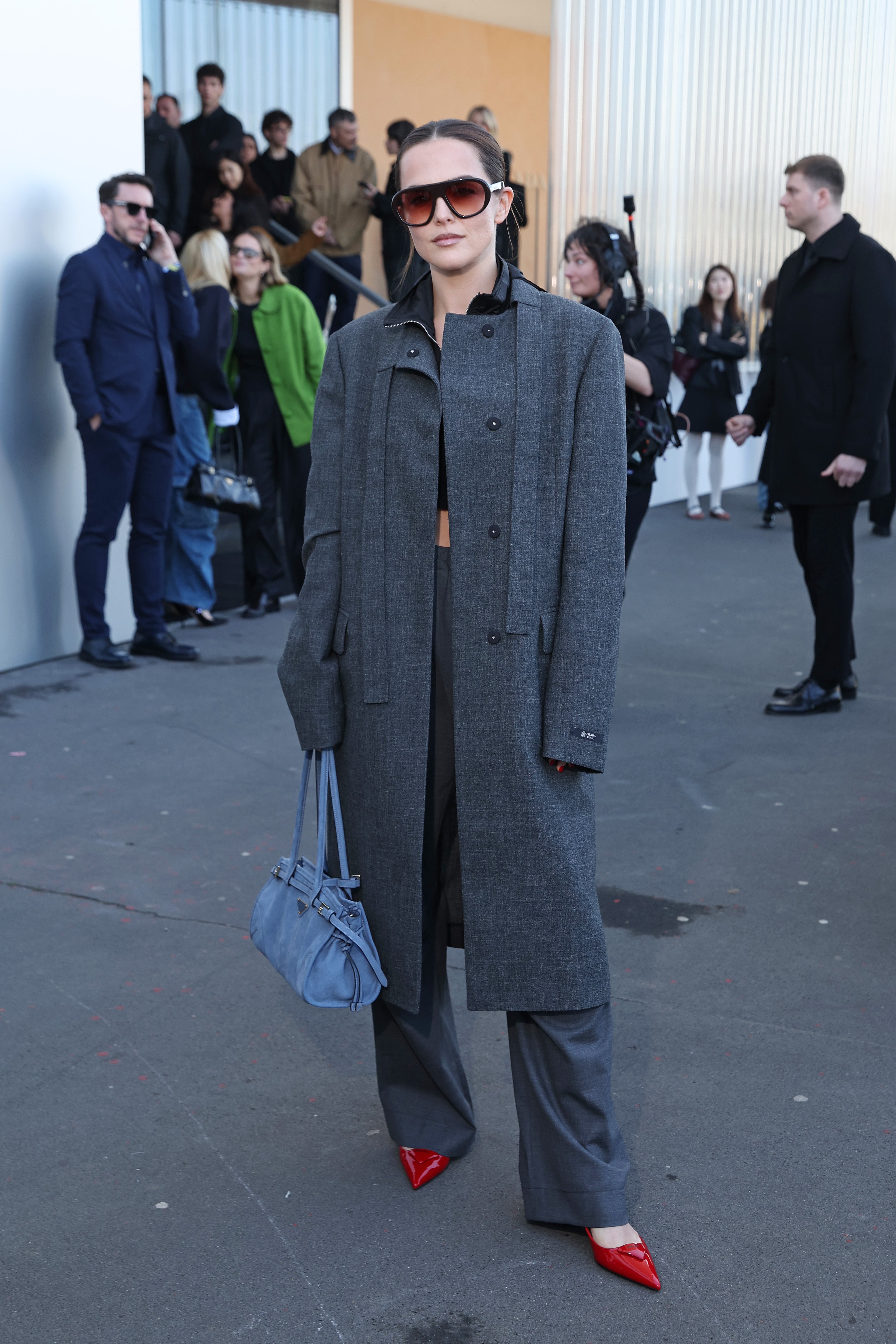 Zoey Deutch showed off some color on her legs at the Dior Milan menswear show last month.