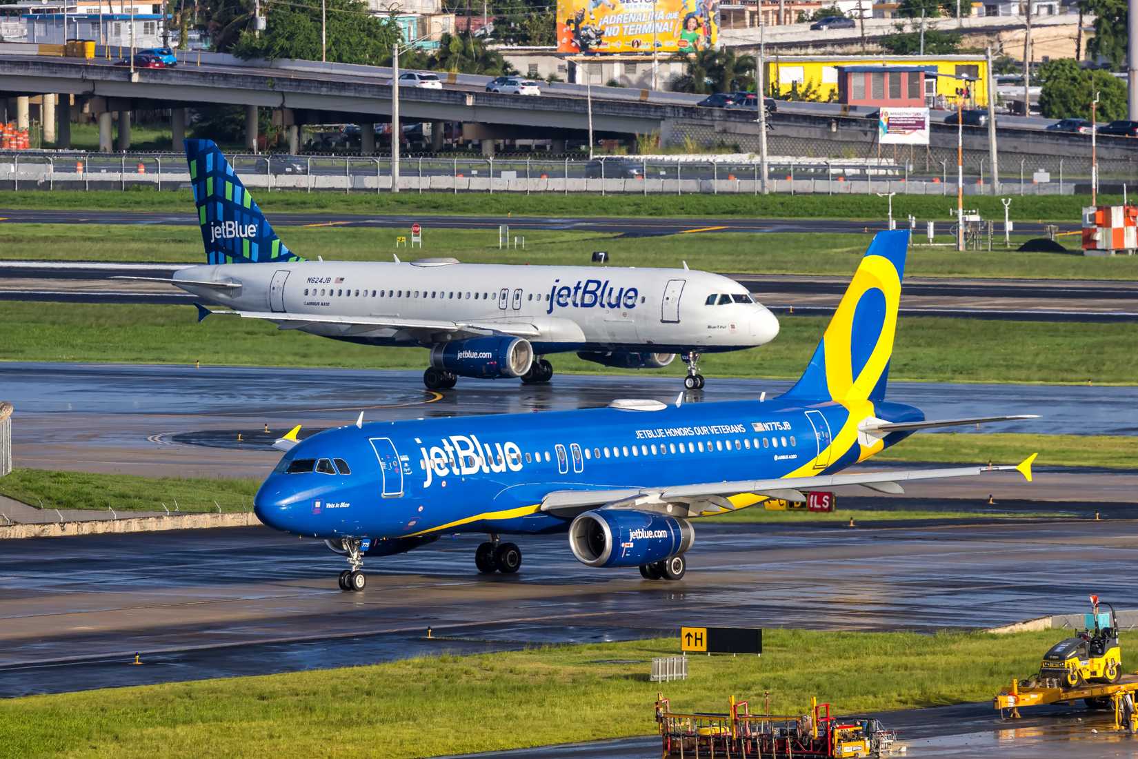 A JetBlue Airways Airbus A320 aircraft with JetBlue Honors our special Veterans products at the airport in San Juan, Puerto Rico.