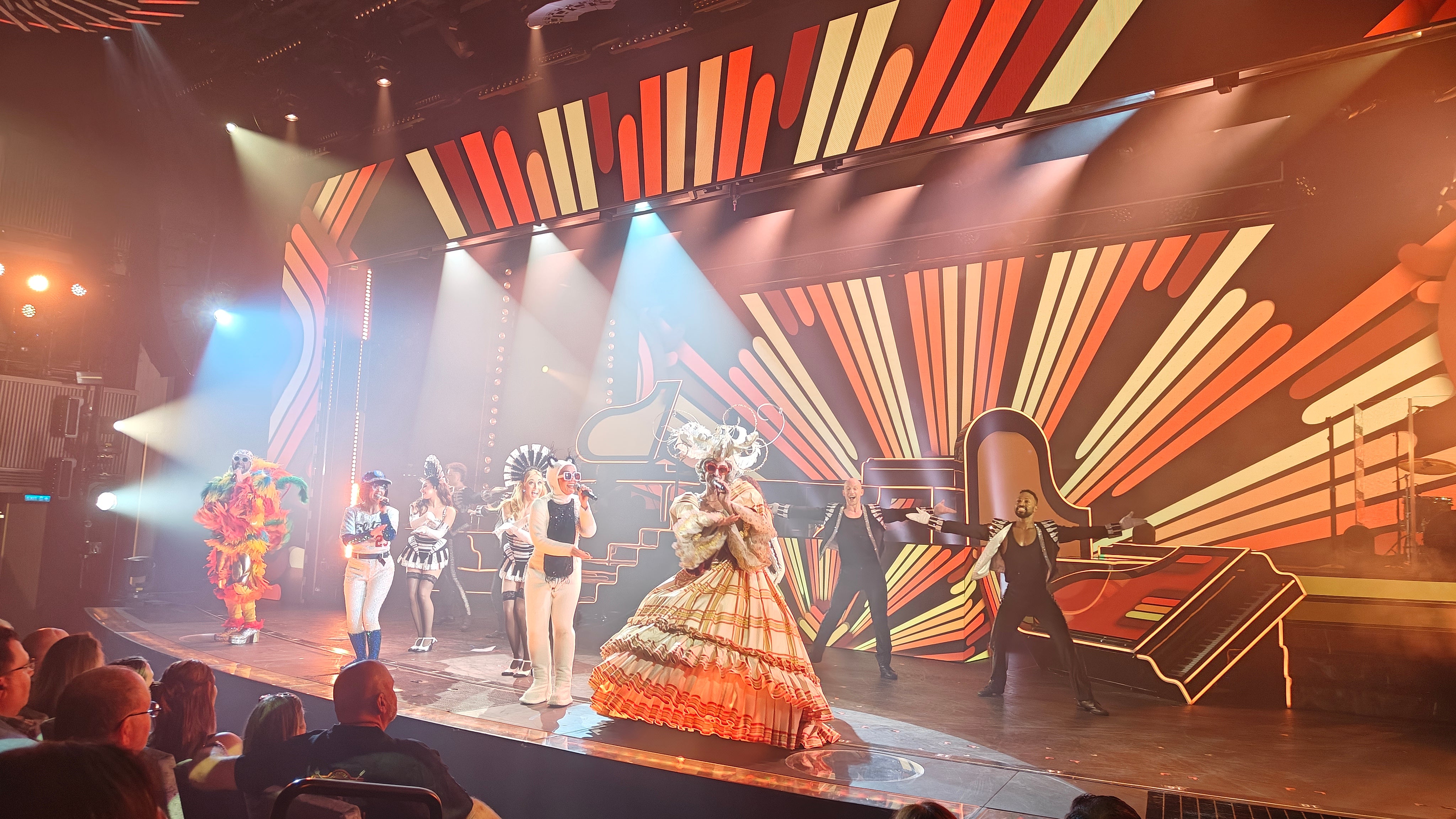 Four versions of Elton John appear during Luna's performance