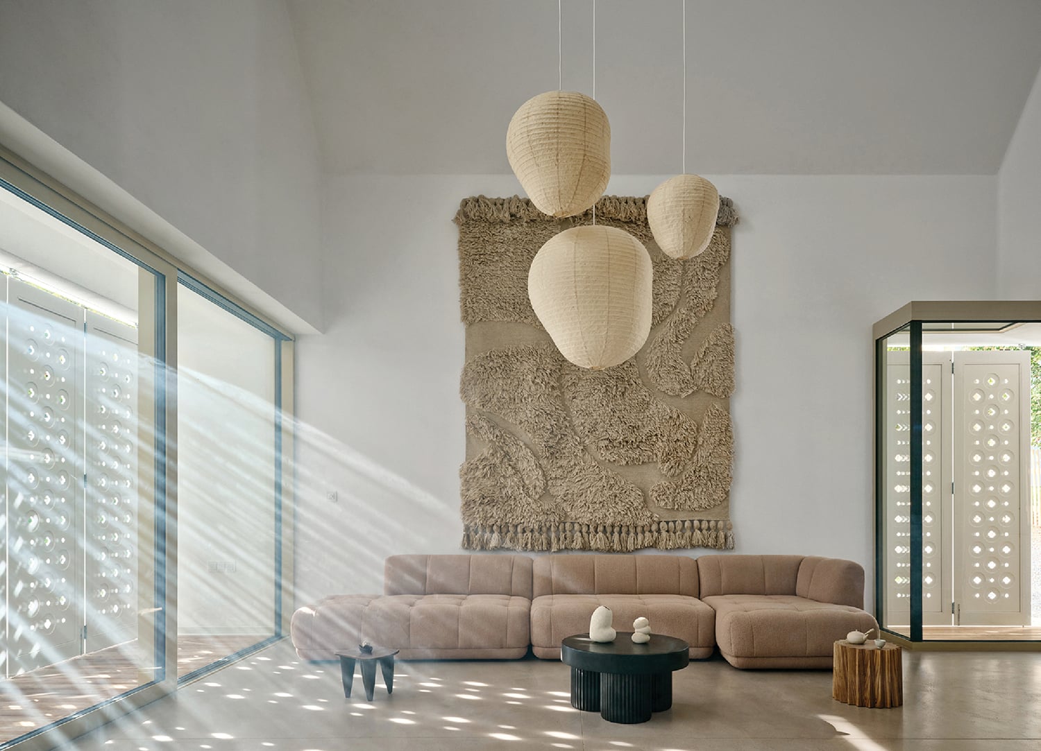 Japanese interior design living room with large wall hanging above the bed.
