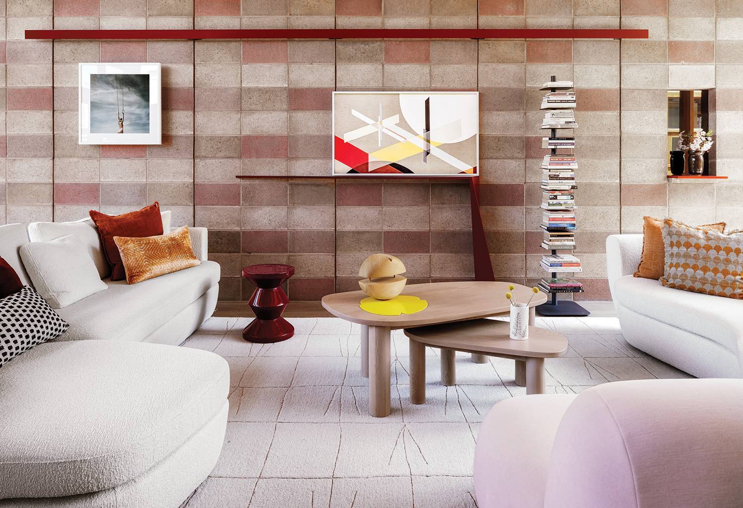 Japanese interior design living room with sofa, coffee table, and bookshelf