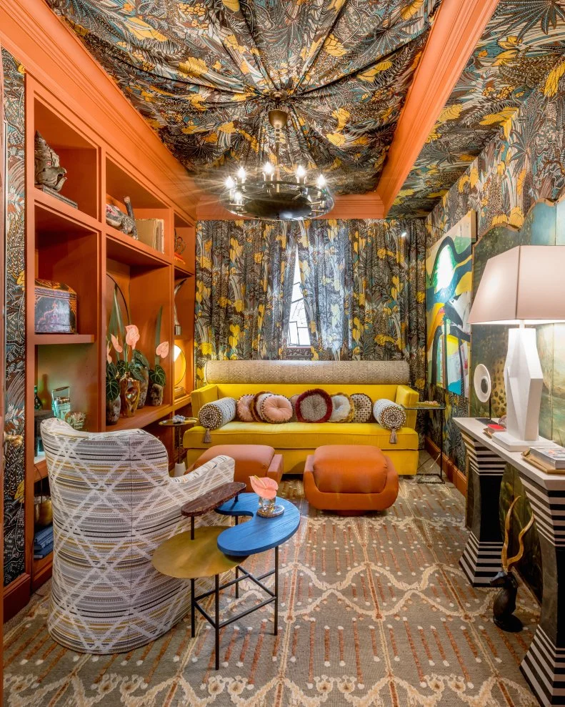 Eclectic Study With Fabric, Tented Ceiling, Orange Shade and Bookshelves
