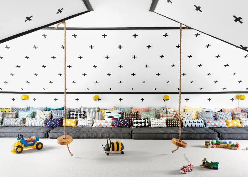 Eclectic White Playroom With Swiss Cross Wall Feature