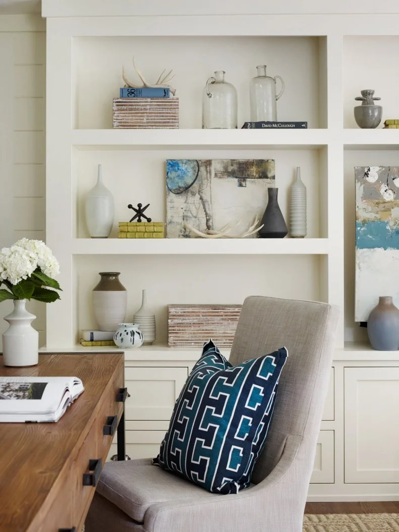 New Home Office With Built-in Bookshelf and Beach-Inspired Decor A Memorable Home Office With Built-in Bookshelf And Upholstered Armchair