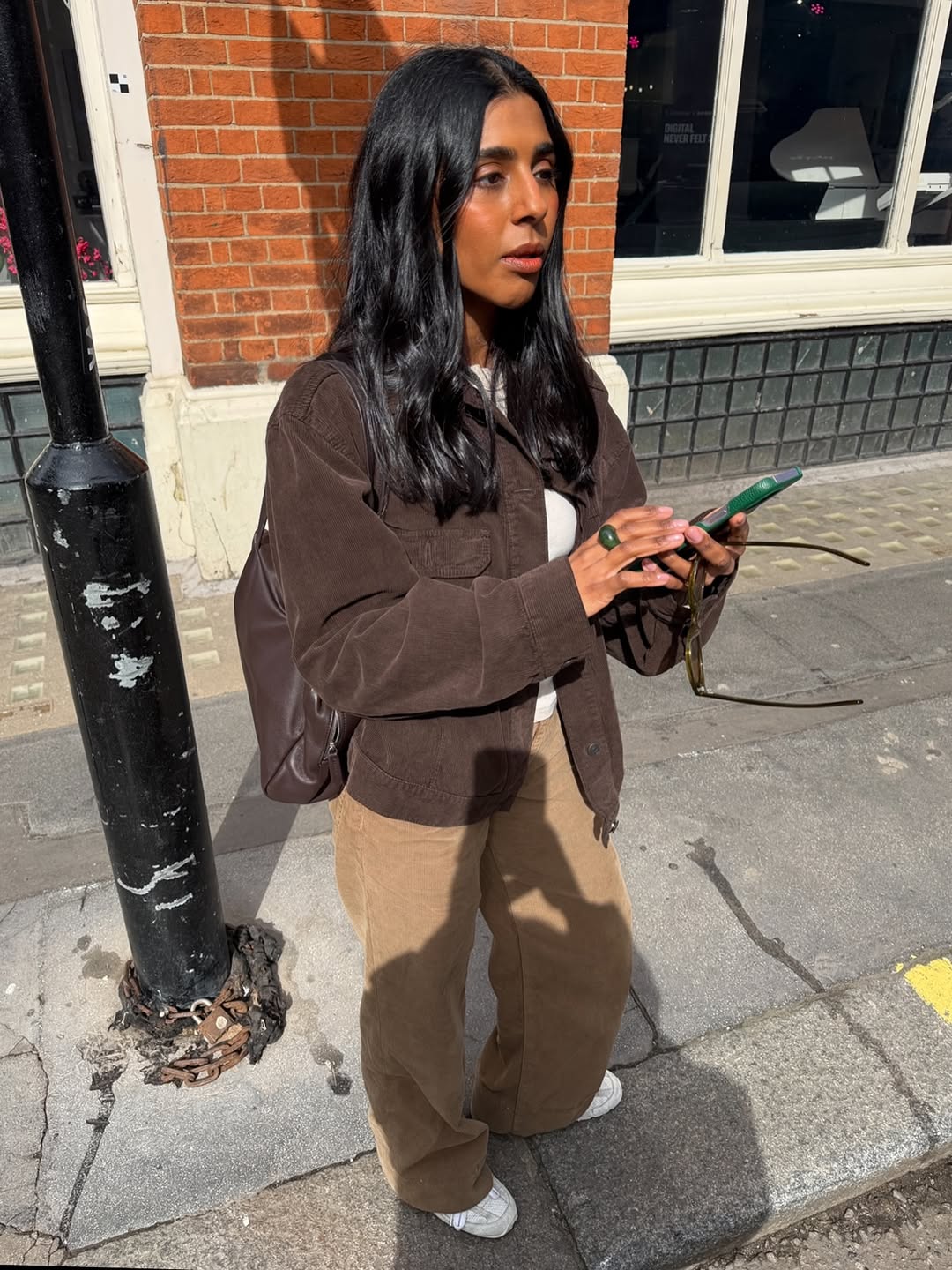 Influencer Monikh wears brown denim.