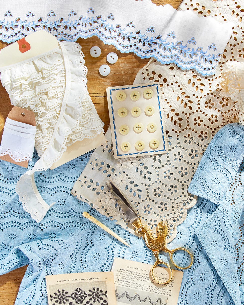 art supplies for sewing including lace buttons and scissors
