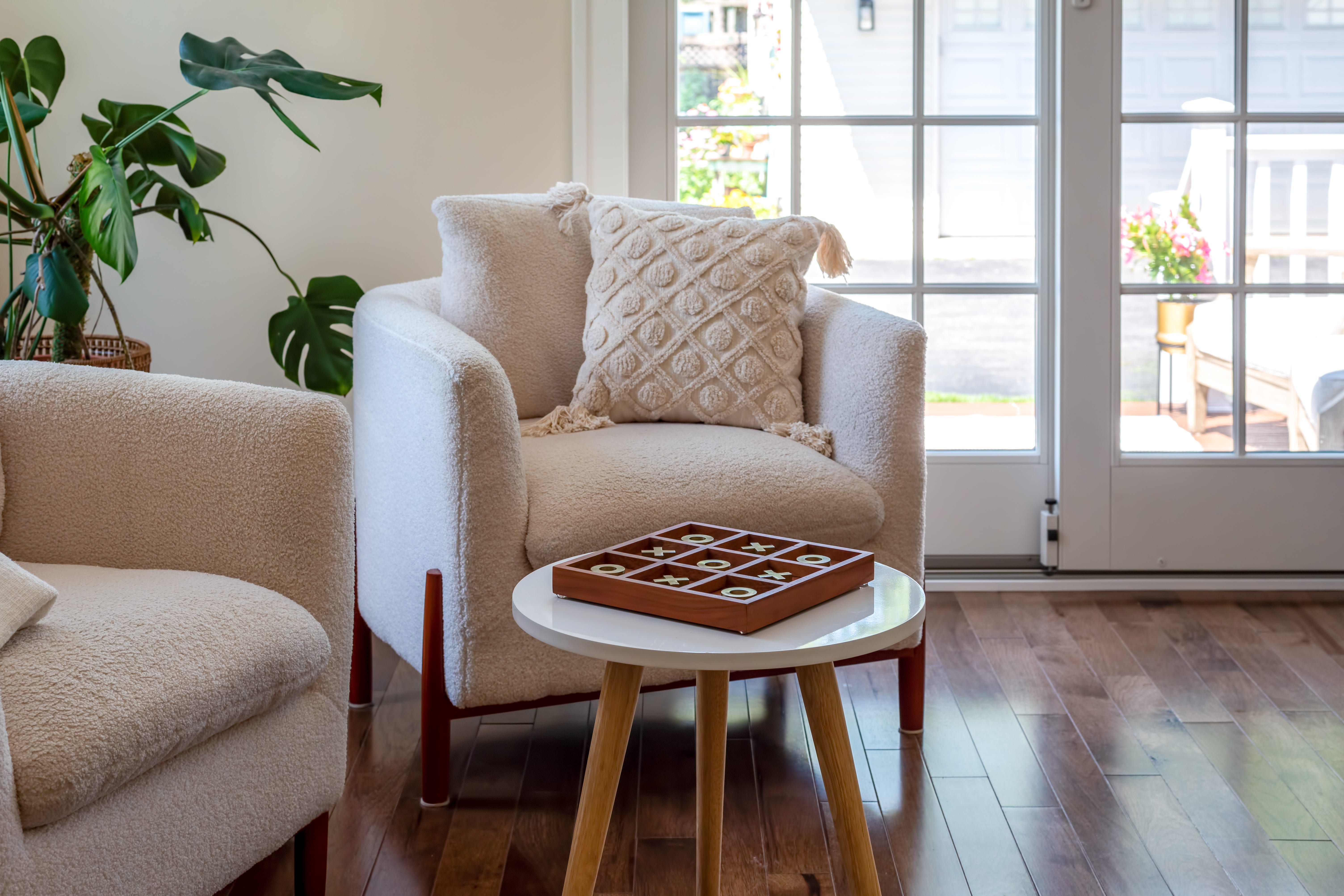 great sitting area in the sun room with french doors