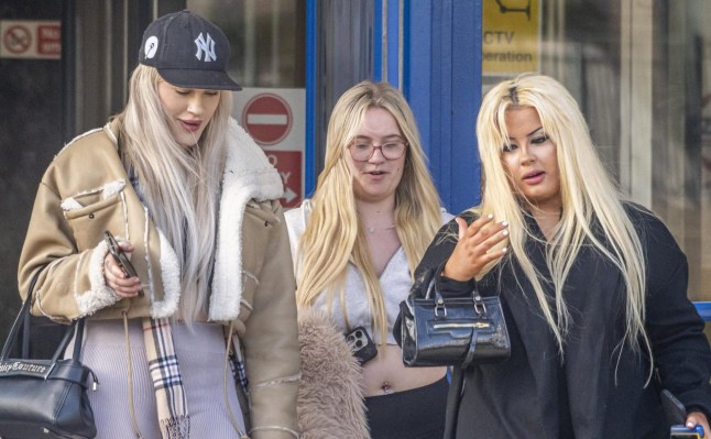 Larisa Sumovskaja (left), Jasmine Orchard (centre) and Kera McKeown (right) leave Poole Magistrates' Court.